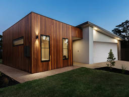Prefabricated frame-panel house kit